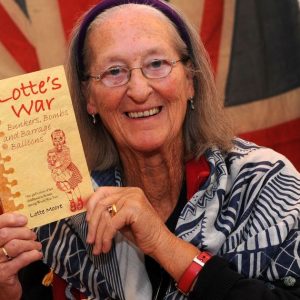 lady holding Lotte's war book